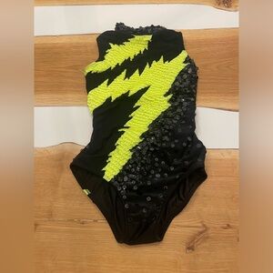 Black and yellow dance costume, sequins, cris cross straps on back